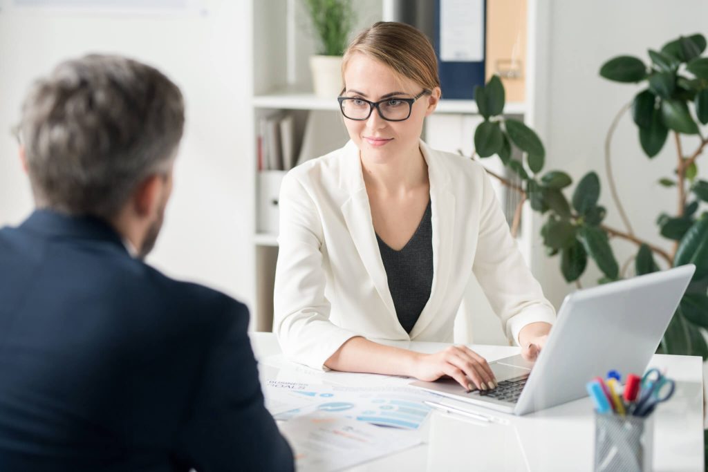 Female Business Consultant Working with client